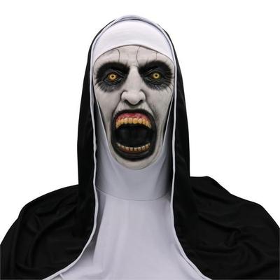Glowing horror mask for Halloween worn by a spooky figure in a black and white costume with a terrifying expression.