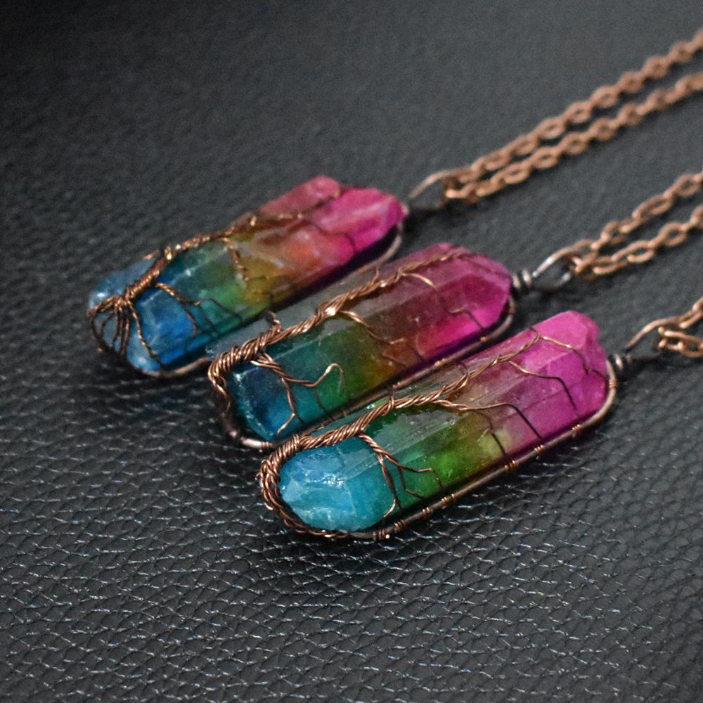 Stone crystal pendant necklace with crystal-column pendant and rainbow-inspired design